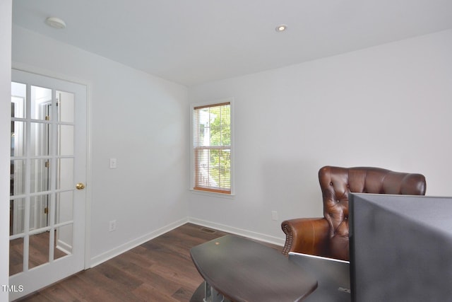 1056 Evening Shade Ave, Rolesville, NC 27571 - living area with wood finished floors, baseboards, and recessed lighting