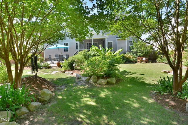1056 Evening Shade Ave, Rolesville, NC 27571 - view of green lawn featuring a sunroom