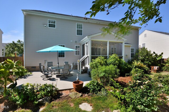 1056 Evening Shade Ave, Rolesville, NC 27571 - rear view of property featuring a sunroom, a patio, and crawl space