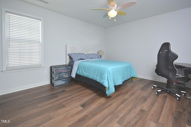 1056 Evening Shade Ave, Rolesville, NC 27571 - bedroom with baseboards, wood finished floors, and a ceiling fan