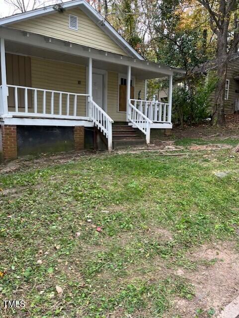 116 Dunstan Ave, Durham, NC 27707 - view of front of home with a porch