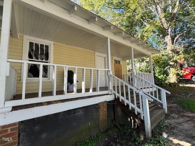 116 Dunstan Ave, Durham, NC 27707 - view of side of property featuring a porch and crawl space