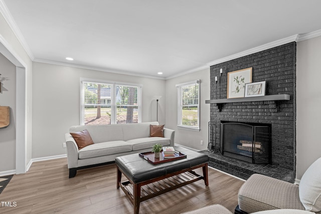 3 Haggis Ct, Durham, NC 27705 - living room featuring light wood-style flooring, a fireplace, baseboards, recessed lighting, and ornamental molding