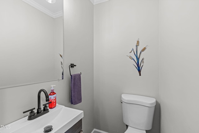 3 Haggis Ct, Durham, NC 27705 - bathroom with crown molding, toilet, and vanity