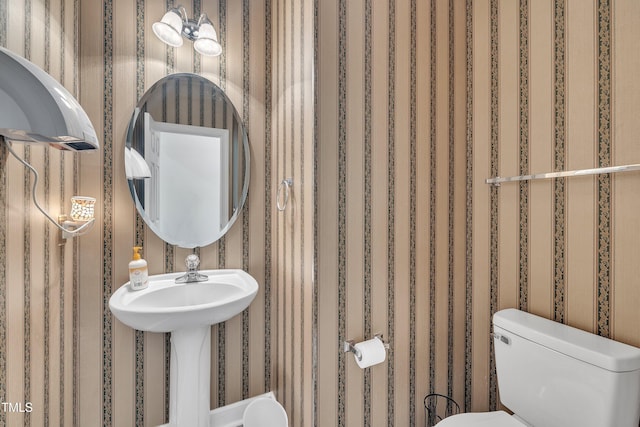 1325 Red Brick Rd, Garner, NC 27529 - bathroom with toilet and wallpapered walls