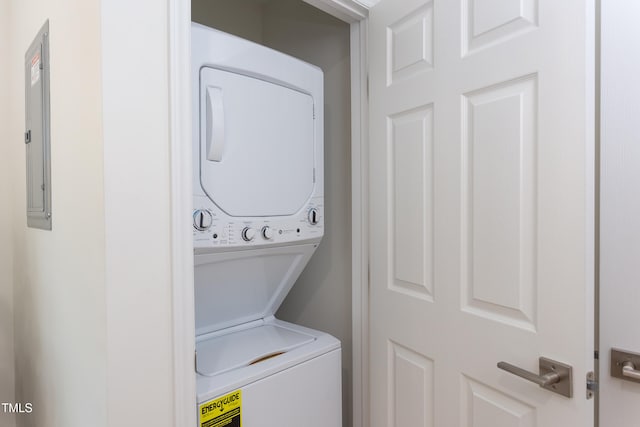 1309 Hudson Ave Unit D12, Durham, NC 27705 - laundry room featuring stacked washing machine and dryer and electric panel