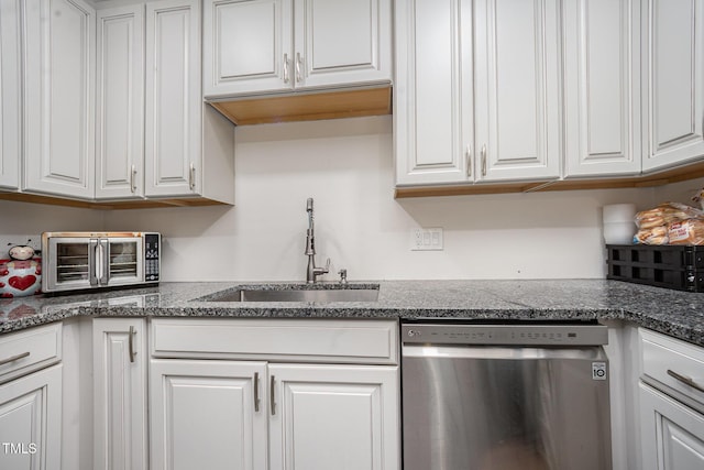 7368 Ryan St, Fayetteville, NC 28314 - kitchen featuring dishwasher, a sink, white cabinets, and dark stone countertops