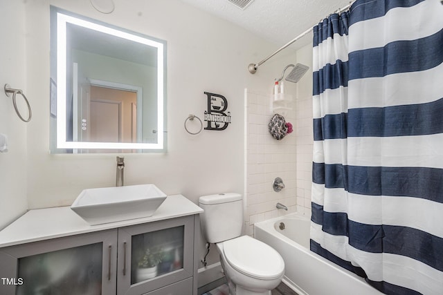 7368 Ryan St, Fayetteville, NC 28314 - full bath featuring toilet, shower / bathtub combination with curtain, vanity, and a textured ceiling