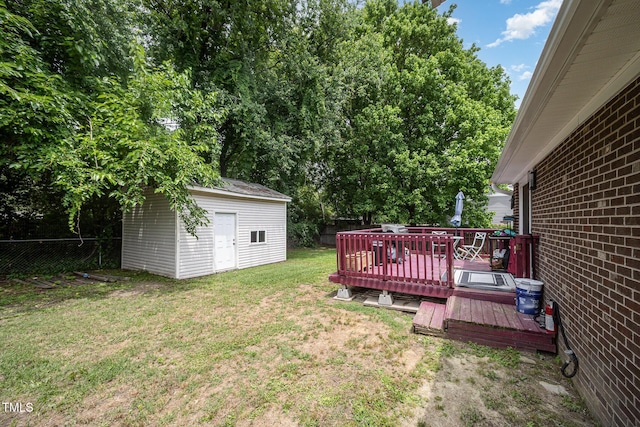 7368 Ryan St, Fayetteville, NC 28314 - view of yard featuring a deck and an outdoor structure
