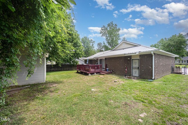 7368 Ryan St, Fayetteville, NC 28314 - view of yard with a wooden deck