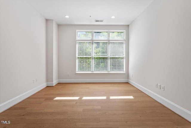 317 W Morgan St Unit 320, Raleigh, NC 27601 - unfurnished room featuring wood finished floors, baseboards, and recessed lighting