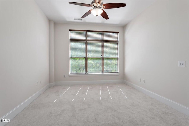 317 W Morgan St Unit 320, Raleigh, NC 27601 - empty room featuring ceiling fan, light carpet, and baseboards