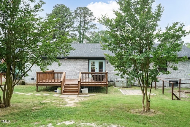 103 Midway Ln, Roanoke Rapids, NC 27870 - back of house with a wooden deck, brick siding, french doors, and a shingled roof