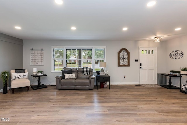 103 Midway Ln, Roanoke Rapids, NC 27870 - living room featuring recessed lighting, baseboards, and wood finished floors
