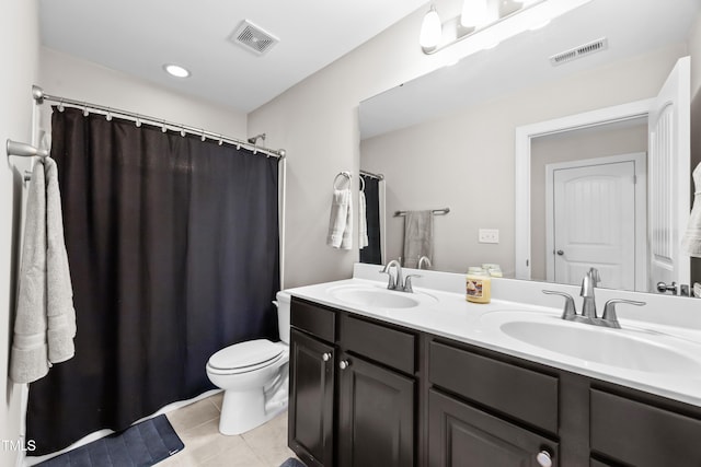 633 Copper Beech Ln, Wake Forest, NC 27587 - bathroom featuring double vanity, tile patterned flooring, toilet, and a shower with shower curtain