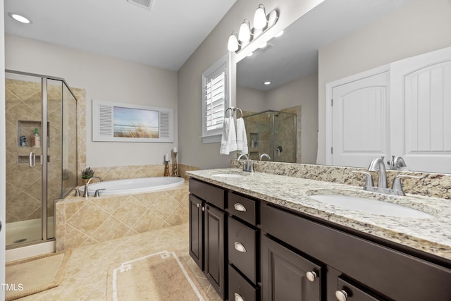 633 Copper Beech Ln, Wake Forest, NC 27587 - full bath with a garden tub, a stall shower, double vanity, and tile patterned flooring