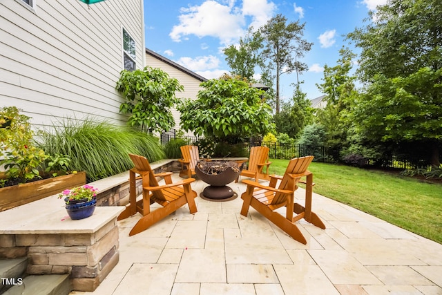 633 Copper Beech Ln, Wake Forest, NC 27587 - view of patio / terrace with a fire pit