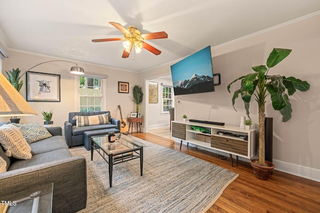 1905 Bivins St, Durham, NC 27707 - living area featuring a ceiling fan, wood finished floors, healthy amount of natural light, baseboards, and ornamental molding