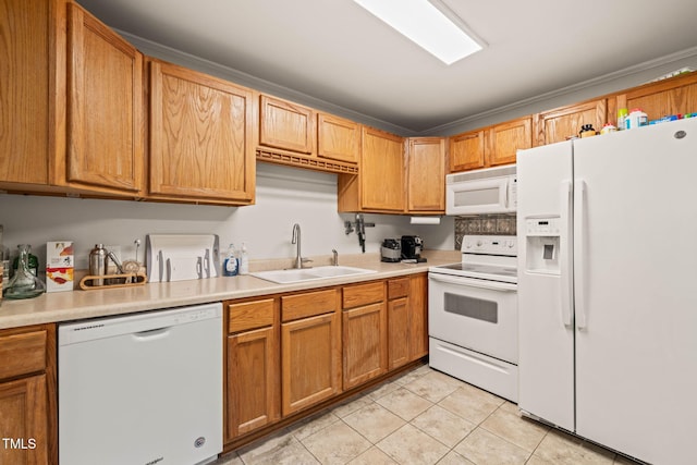 1905 Bivins St, Durham, NC 27707 - kitchen with white appliances, a sink, light countertops, and light tile patterned flooring