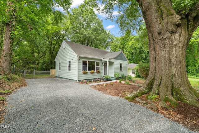 1905 Bivins St, Durham, NC 27707 - view of front of property featuring roof with shingles and driveway