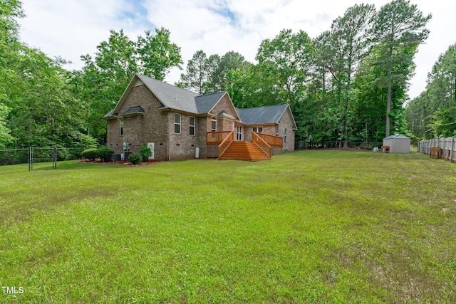 1016 Luminary Ln, Willow Springs, NC 27592 - view of yard featuring view of wooded area and a deck