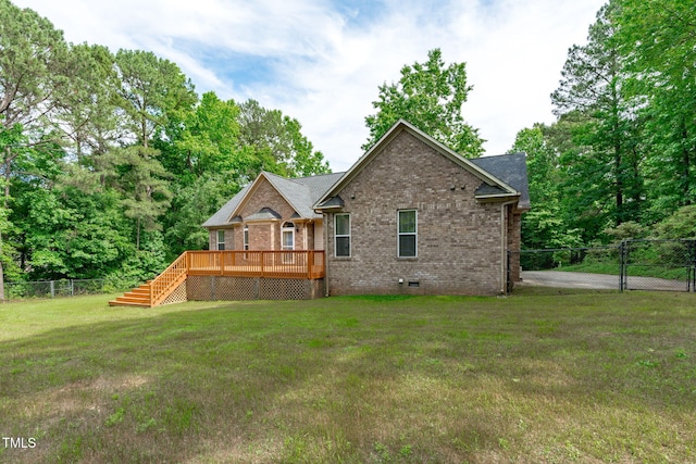1016 Luminary Ln, Willow Springs, NC 27592 - back of house with brick siding, a wooden deck, crawl space, stairs, and a gate