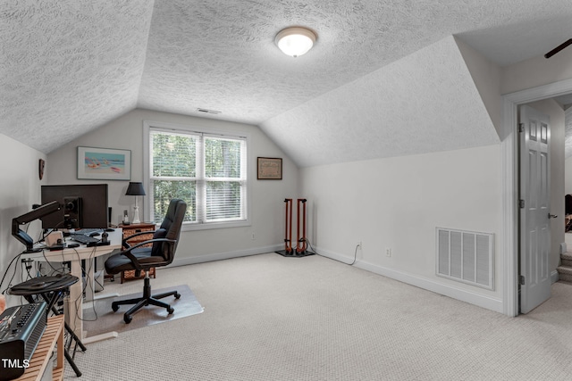 1016 Luminary Ln, Willow Springs, NC 27592 - carpeted home office with a textured ceiling, lofted ceiling, and baseboards
