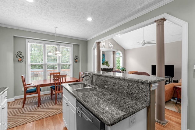 1016 Luminary Ln, Willow Springs, NC 27592 - kitchen with dishwasher, decorative columns, a center island with sink, a sink, and crown molding