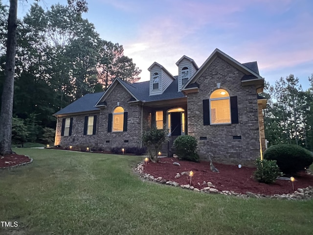 1016 Luminary Ln, Willow Springs, NC 27592 - view of front of house featuring crawl space, a front yard, and brick siding