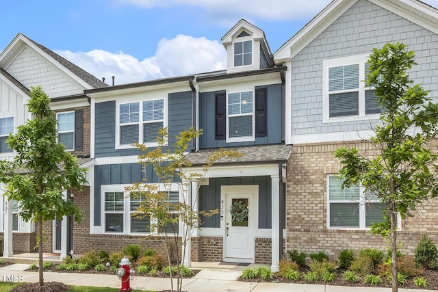 433 Parker Station Ave, Fuquay Varina, NC 27526 - townhome / multi-family property featuring brick siding and board and batten siding