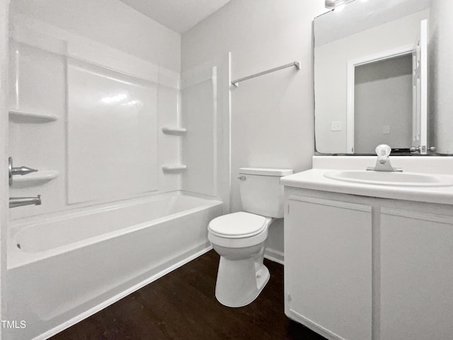 216 E Hinton St, Clayton, NC 27520 - full bath featuring toilet, vanity, wood finished floors, shower / tub combination, and baseboards
