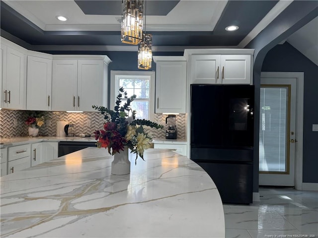 504 E Edinborough Ave, Raeford, NC 28376 - kitchen featuring black appliances, a raised ceiling, light stone countertops, white cabinetry, and decorative backsplash