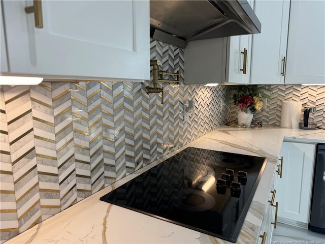 504 E Edinborough Ave, Raeford, NC 28376 - kitchen featuring black electric stovetop, ventilation hood, decorative backsplash, and light stone counters