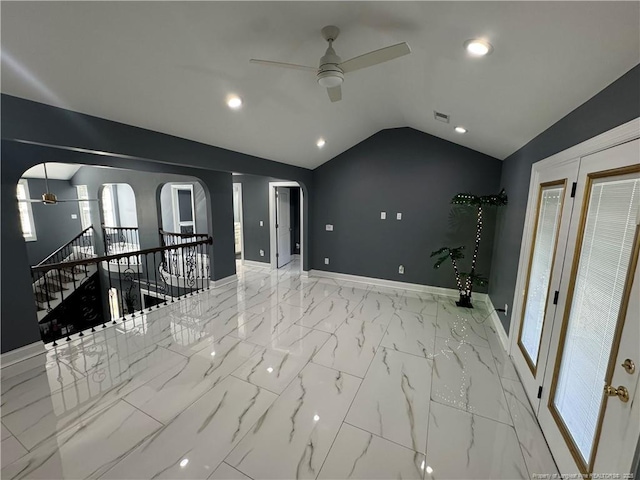 504 E Edinborough Ave, Raeford, NC 28376 - spare room with ceiling fan, lofted ceiling, baseboards, arched walkways, and marble finish flooring