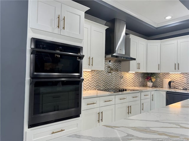 504 E Edinborough Ave, Raeford, NC 28376 - kitchen featuring wall chimney range hood, black appliances, white cabinetry, light stone countertops, and backsplash