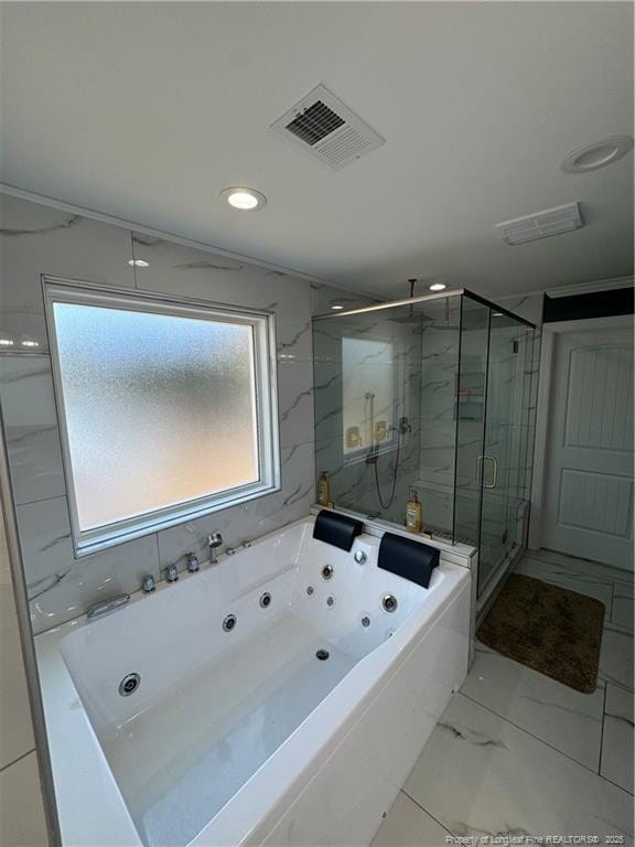 504 E Edinborough Ave, Raeford, NC 28376 - bathroom featuring a stall shower, a whirlpool tub, marble finish floors, and recessed lighting