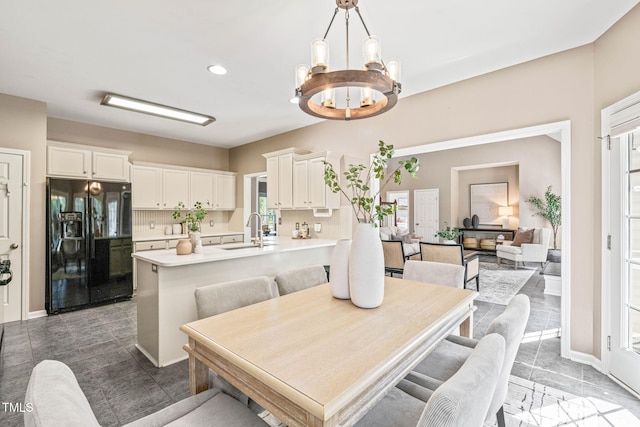 1717 Ormond Rd, Hurdle Mills, NC 27541 - dining area with a chandelier, tile patterned flooring, recessed lighting, and baseboards