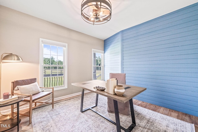1717 Ormond Rd, Hurdle Mills, NC 27541 - home office with a chandelier, wood finished floors, and baseboards