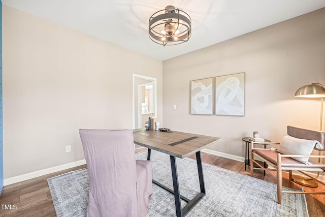 1717 Ormond Rd, Hurdle Mills, NC 27541 - office area featuring wood finished floors, a chandelier, and baseboards