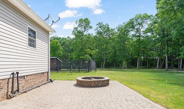 1717 Ormond Rd, Hurdle Mills, NC 27541 - view of patio featuring a fire pit
