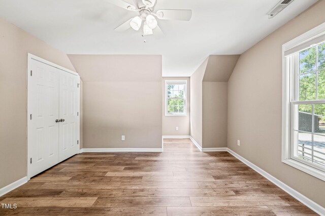 1717 Ormond Rd, Hurdle Mills, NC 27541 - additional living space featuring vaulted ceiling, light wood-style flooring, a ceiling fan, and baseboards