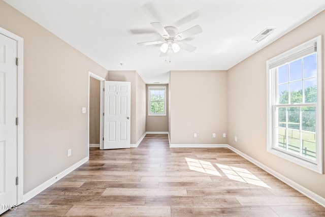 1717 Ormond Rd, Hurdle Mills, NC 27541 - unfurnished bedroom with light wood-type flooring, baseboards, and ceiling fan
