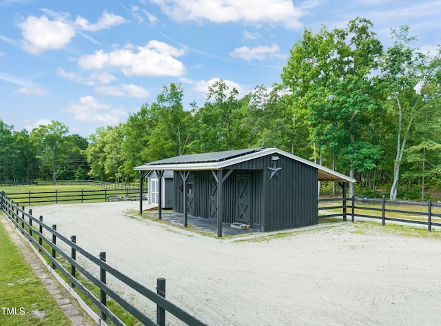 1717 Ormond Rd, Hurdle Mills, NC 27541 - horse barn with a view of trees