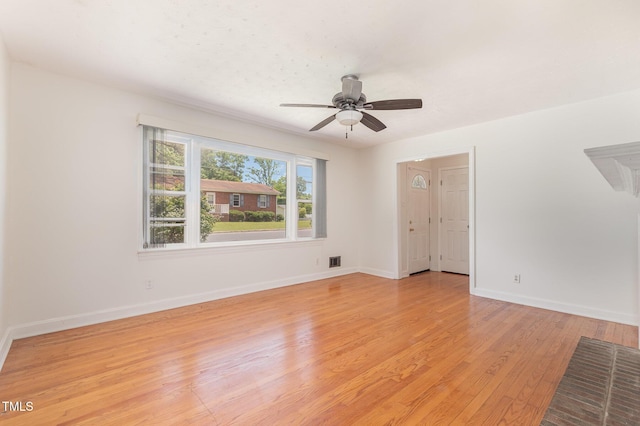 408 N Stewart St, Clayton, NC 27520 - empty room featuring light wood-style floors, baseboards, and ceiling fan