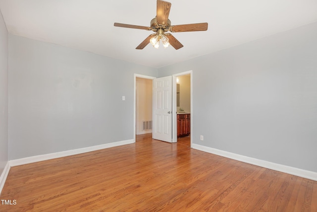 408 N Stewart St, Clayton, NC 27520 - empty room with baseboards and light wood-style flooring