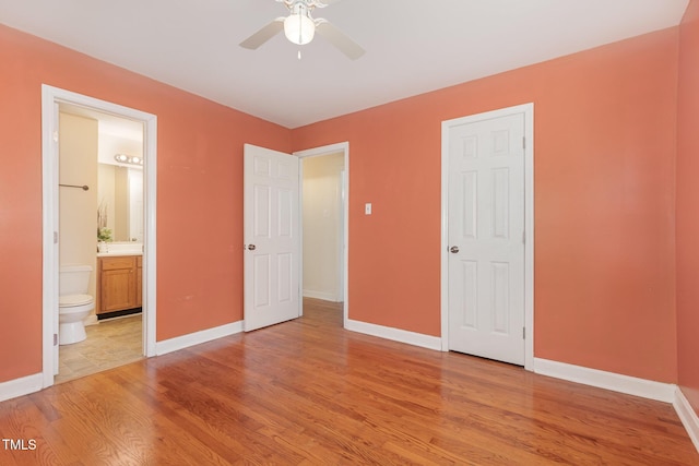 408 N Stewart St, Clayton, NC 27520 - unfurnished bedroom featuring light wood finished floors and baseboards