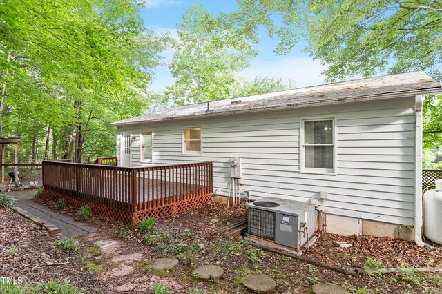 2612 Wade Hampton Rd, Hillsborough, NC 27278 - back of property with cooling unit and a wooden deck