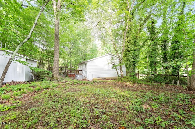 2612 Wade Hampton Rd, Hillsborough, NC 27278 - view of yard featuring a deck and an outbuilding