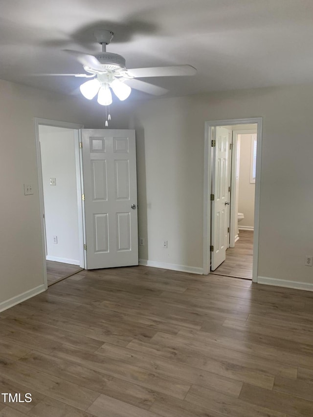 2001 Ballston Pl, Knightdale, NC 27545 - unfurnished room with ceiling fan, baseboards, and wood finished floors