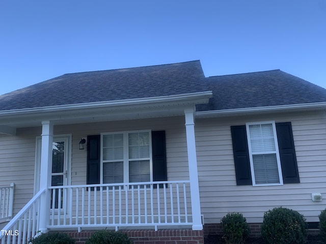 2001 Ballston Pl, Knightdale, NC 27545 - view of front of property with roof with shingles and covered porch